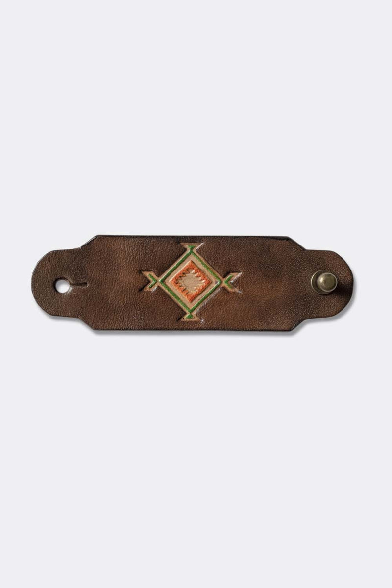 Woggle, bandana / neckerchief slide in brown leather with a square native pattern stamp