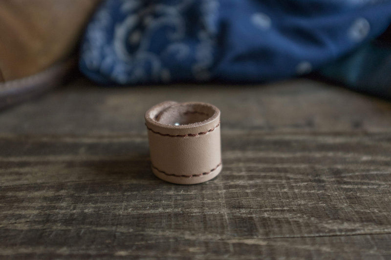 Woggle, bandana / neckerchief slide - in natural leather. Duke & Sons Leather, close up view