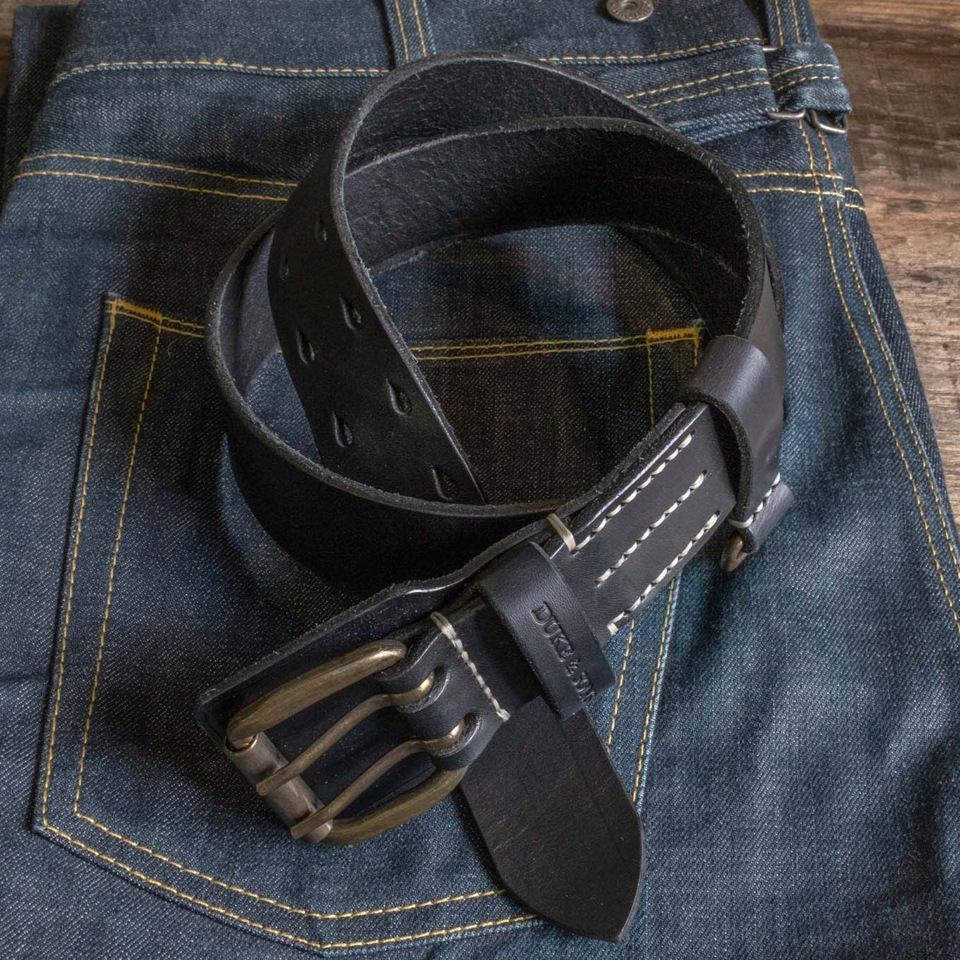 Heavy Duty leather belt in black with extra belt loop, on a jeans. Duke & Sons Leather