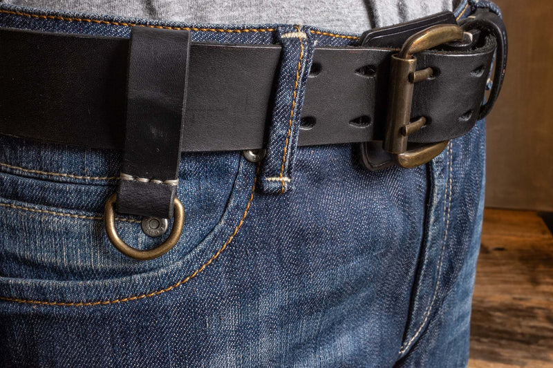 Heavy Duty leather belt in black with extra belt loop, wearing on a jeans. Duke & Sons Leather
