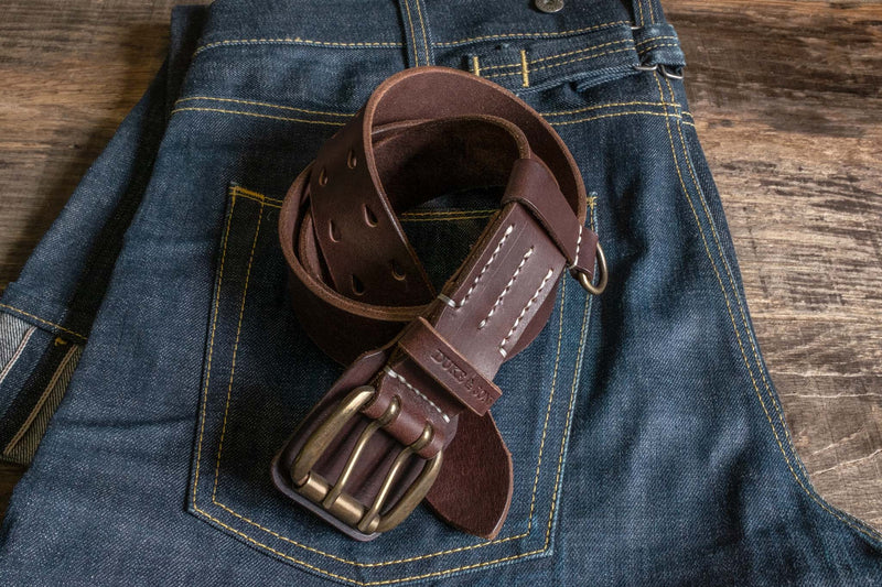 Heavy Duty leather belt in dark brown with extra belt loop, on a jeans. Duke & Sons Leather