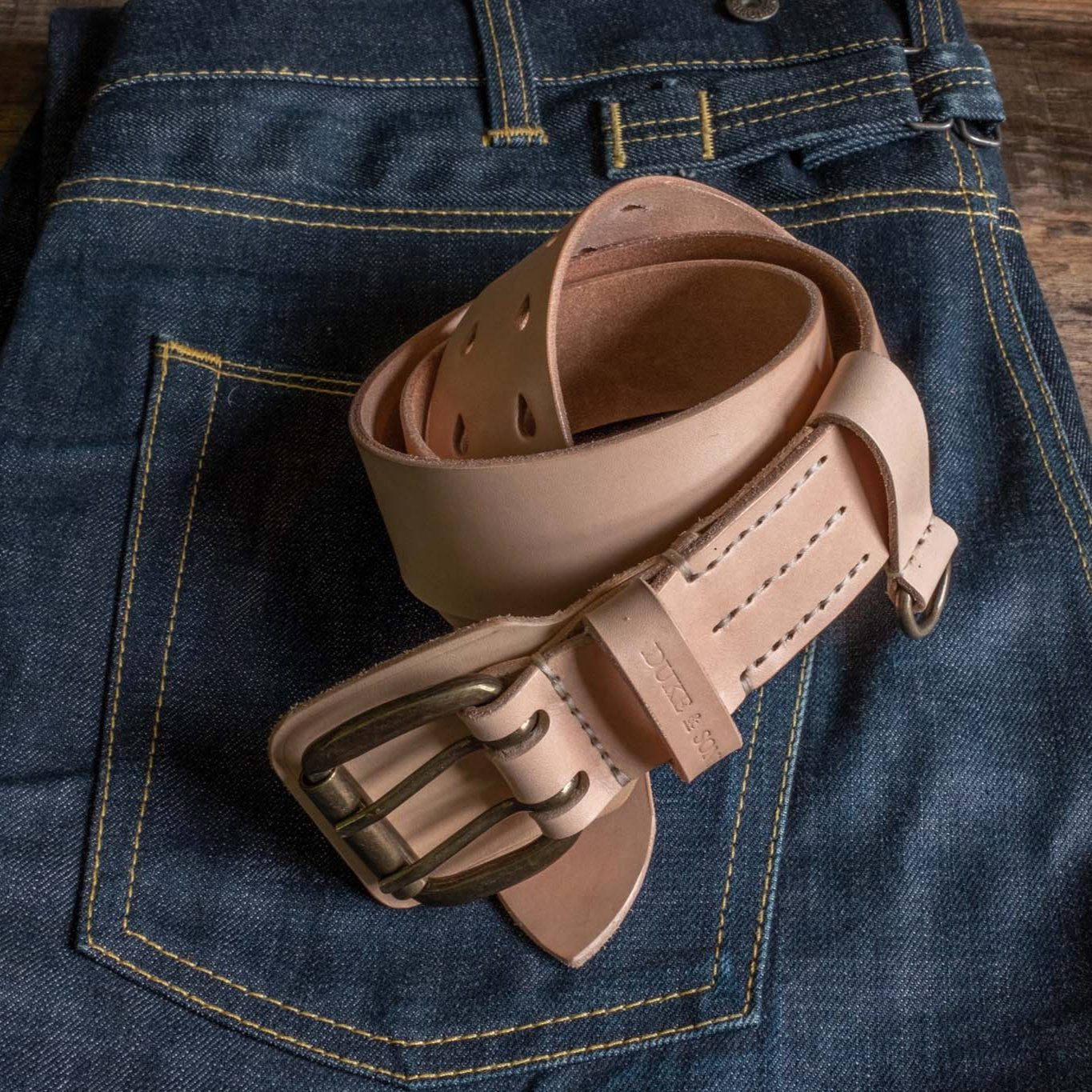 Heavy Duty, natural leather belt with extra belt loop, on a jeans. Duke & Sons Leather