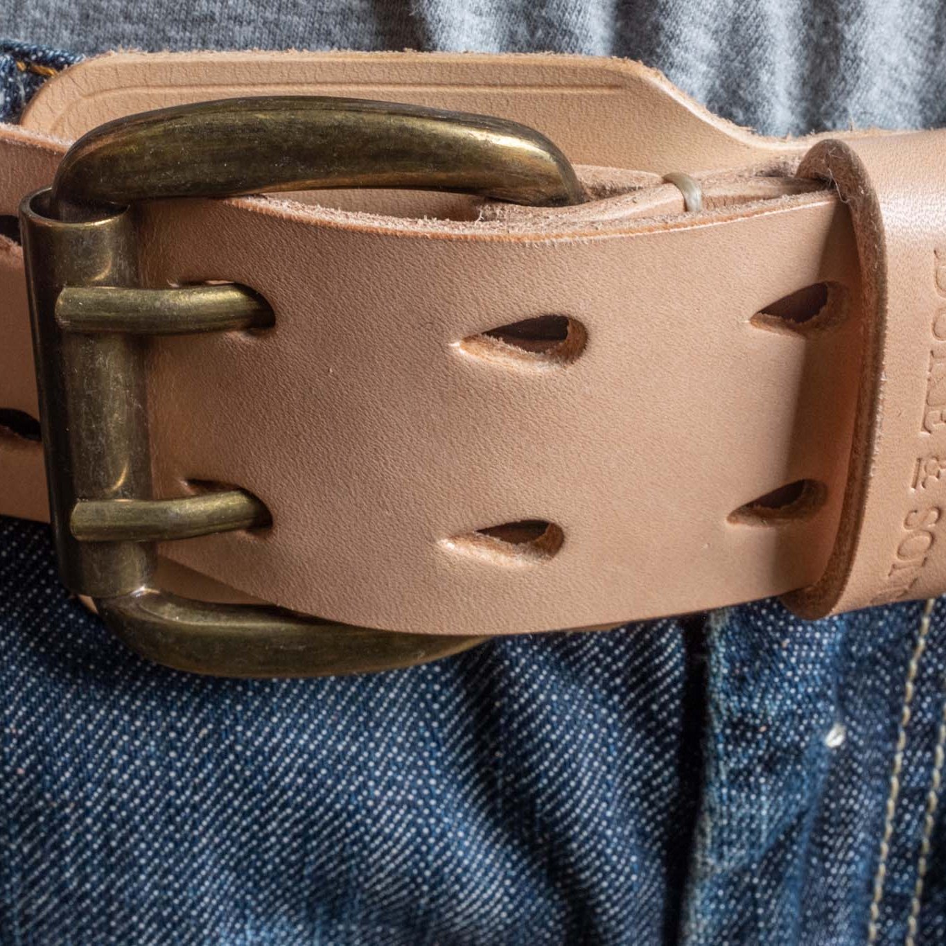 Heavy Duty, natural leather with extra belt loop, wearing on a jeans. Duke & Sons Leather, front view