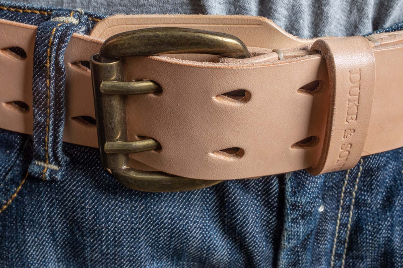 Heavy Duty, natural leather with extra belt loop, wearing on a jeans. Duke & Sons Leather, front view