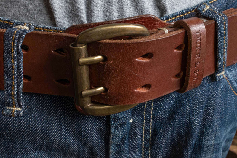 Heavy Duty leather belt in red brown with extra belt loop, wearing on a jeans. Duke & Sons Leather, front view